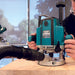 makita-rp2301fc05-12-7mm-1-2-2100w-plunge-router.jpg